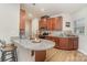 Well-equipped kitchen featuring granite countertops, wood cabinets, and stainless steel appliances at 1108 Stella Ct, Monroe, NC 28110