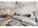 Cozy living room with a dining table and open access to the kitchen area, filled with natural light at 1108 Stella Ct, Monroe, NC 28110