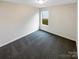 Neutral bedroom with a window providing natural light at 1144 Amberlight Cir, Salisbury, NC 28144