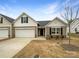 Charming single-story home with a two-car garage and inviting curb appeal at 1144 Amberlight Cir, Salisbury, NC 28144