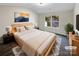 Cozy main bedroom featuring a large window, ample space, and neutral decor at 1144 Amberlight Cir, Salisbury, NC 28144