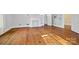 Bedroom with hardwood floors, fireplace, and natural light at 121 N Congress St, York, SC 29745