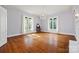 Bedroom featuring hardwood floors, large windows, and a chandelier at 121 N Congress St, York, SC 29745