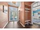 Charming entryway with a built-in bench, coat hooks, and double doors leading to the outside at 121 N Congress St, York, SC 29745