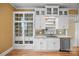 Kitchen featuring white cabinets, granite countertops and hardwood floors at 121 N Congress St, York, SC 29745