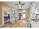 Eat-in kitchen featuring stainless appliances, granite countertops and hardwood floors at 121 N Congress St, York, SC 29745