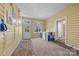 Bright laundry room with utility sink, a window and storage at 121 N Congress St, York, SC 29745