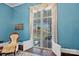 Cozy living room with French doors leading to the porch, offering a seamless blend of indoor and outdoor living spaces at 121 N Congress St, York, SC 29745