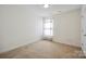 Empty bedroom with a window at 1219 Catawba Run Rd, Lowell, NC 28098