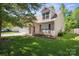 Charming home boasts a well-manicured lawn, inviting entrance, and attached garage, perfect for suburban living at 1219 Catawba Run Rd, Lowell, NC 28098