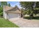 Spacious two-car garage and driveway offer ample parking at this well-maintained home at 1219 Catawba Run Rd, Lowell, NC 28098