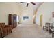 Bright living room featuring high ceilings, neutral carpet, and traditional furnishings at 1219 Catawba Run Rd, Lowell, NC 28098