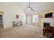 Bright living room with a fireplace and french doors leading outside at 1219 Catawba Run Rd, Lowell, NC 28098