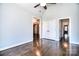 Spacious bedroom with hardwood floors, ensuite access, and abundant natural light at 13008 Ginovanni Way, Mint Hill, NC 28227