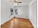 Bright bedroom with natural light from two windows, hardwood floors and a spacious closet at 1442 Rainforest Ct, Gastonia, NC 28054