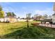 Large backyard featuring a shed, a sandbox, playset, and lots of room to play at 1448 Morrocroft Trl, Gastonia, NC 28054