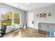 Bright, airy bedroom with large window, hardwood floors, and calming natural light at 1448 Morrocroft Trl, Gastonia, NC 28054