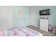 Comfortable bedroom with soft blue walls and ample closet space at 1448 Morrocroft Trl, Gastonia, NC 28054