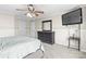 Comfortable bedroom featuring natural light, ceiling fan, and ample closet space at 1448 Morrocroft Trl, Gastonia, NC 28054