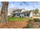 Charming two-story home with a well-manicured front yard, showcasing curb appeal at 1448 Morrocroft Trl, Gastonia, NC 28054