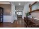 Inviting foyer with elegant wainscoting, hardwood floors, and stylish console table at 15125 Skypark Dr, Huntersville, NC 28078