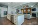 Open concept kitchen featuring stainless steel appliances, granite countertops, and access to the living room at 15125 Skypark Dr, Huntersville, NC 28078