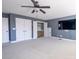 Spacious room with two closets, TV, plush carpet, and natural light at 15125 Skypark Dr, Huntersville, NC 28078