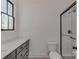 Bathroom featuring a white vanity and a glass shower at 155 Eagle Chase Ln, Troutman, NC 28166
