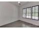 Bedroom featuring hardwood floors and large windows at 155 Eagle Chase Ln, Troutman, NC 28166