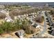 An aerial view shows the neighborhood with manicured lawns and mature trees in a suburban setting at 15916 Foreleigh Rd, Huntersville, NC 28078