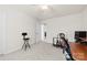 Bright bedroom featuring neutral walls, plush carpeting and an interior door at 15916 Foreleigh Rd, Huntersville, NC 28078