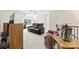 Spacious living room featuring neutral carpet, a ceiling fan and comfortable seating at 15916 Foreleigh Rd, Huntersville, NC 28078