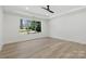 Bright, spacious bedroom with large windows offering scenic views of the outside at 160 Belfry Loop, Mooresville, NC 28117