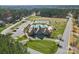 Community pool with tennis court, clubhouse, playground, and well-manicured landscaping in a residential neighborhood at 160 Belfry Loop, Mooresville, NC 28117