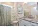 Bright bathroom featuring a shower-tub combination and a granite vanity top at 1638 Sweetmoss Loop, Denver, NC 28037
