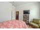 Well-lit bedroom with ample storage space, ceiling fan and plush carpet, offering a warm and inviting atmosphere at 1638 Sweetmoss Loop, Denver, NC 28037