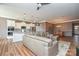 Open-concept living area seamlessly integrates the living room and kitchen, perfect for entertaining at 1638 Sweetmoss Loop, Denver, NC 28037