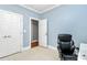 Bright and airy office space with natural light, neutral carpet and a sleek leather chair at 1674 Wakefield Way, Rock Hill, SC 29730