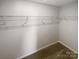 Spacious walk-in closet with wire shelving for organized storage at 174 Hanging Rock Trl # 104, Statesville, NC 28625