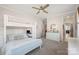 Bright bedroom with a bunk bed, natural light, and comfortable carpet at 180 Twin Sisters Ln, Mooresville, NC 28117