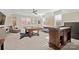 Spacious game room featuring a pool table, wet bar, and comfortable seating area at 180 Twin Sisters Ln, Mooresville, NC 28117