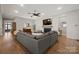Inviting living room features a cozy fireplace and shiplap accent wall at 180 Twin Sisters Ln, Mooresville, NC 28117