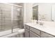Modern bathroom with a glass-enclosed shower and updated vanity with white countertop at 1854 Carrollton Dr, Indian Trail, NC 28079