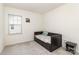 Neutral bedroom with a daybed, natural light, and soft carpet at 1854 Carrollton Dr, Indian Trail, NC 28079