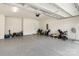 Spacious two-car garage with speckled flooring and plenty of room for storage at 1854 Carrollton Dr, Indian Trail, NC 28079