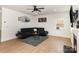 Cozy living room with hardwood floors, a fireplace, and natural light at 1854 Carrollton Dr, Indian Trail, NC 28079