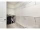 Bright, walk-in closet with wire shelving and carpeted floor at 1854 Carrollton Dr, Indian Trail, NC 28079