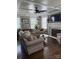 Comfortable living room with a fireplace, hardwood floors, and natural light at 203 S Washington St, Monroe, NC 28112
