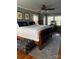 Spacious main bedroom with hardwood floors, decorative rug, and plenty of natural light at 203 S Washington St, Monroe, NC 28112