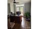Bright home office with french doors, large desk, and hardwood floors at 203 S Washington St, Monroe, NC 28112